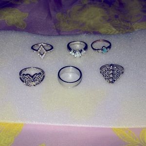 Beautiful mix of silver rings and different designs.